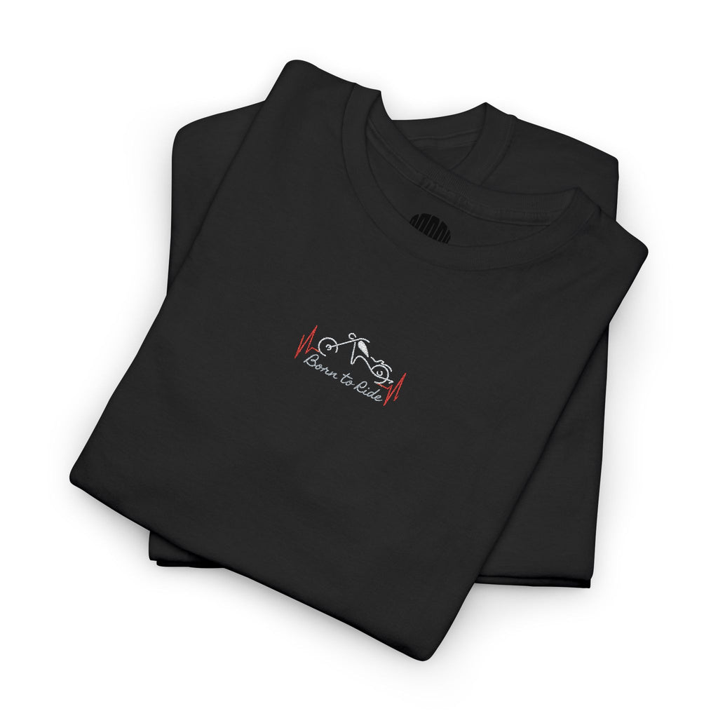 Folded green t-shirt with a small white dog and bee design on a white background
